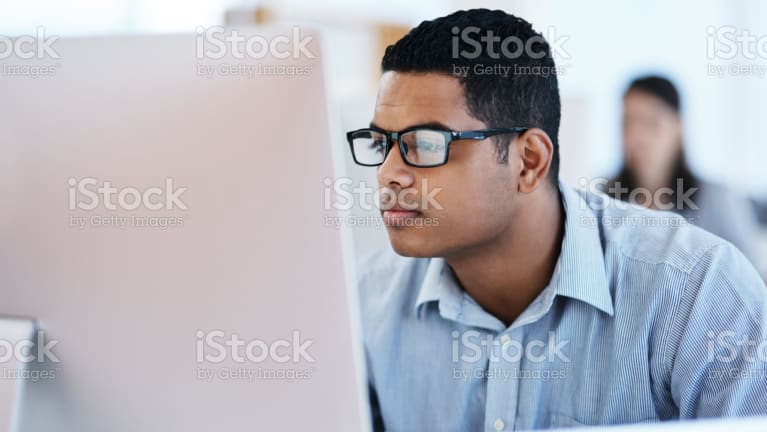 A worker at his computer