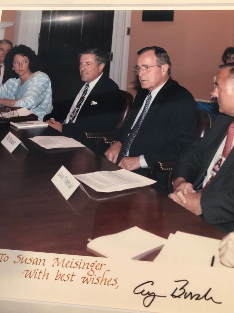 Former SHRM President & CEO Susan Messinger, far left, discusses the ADA legislation with President Bush.