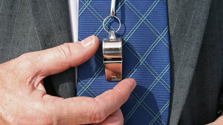 close up of businessman with whistle