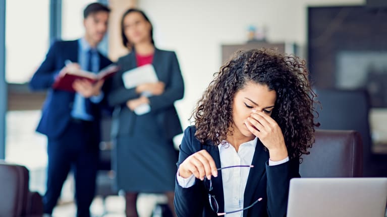 Burnout businesswoman under pressure in the office 