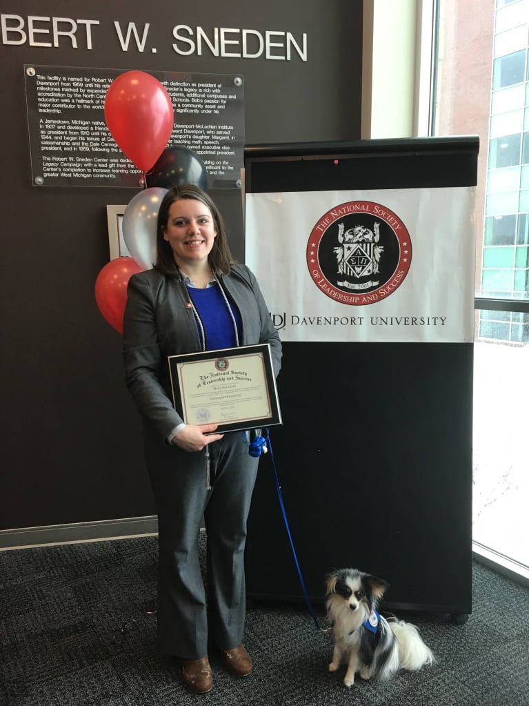 Molly Koroleski and Mater receive a certificate from the National Society of Leadership and Success