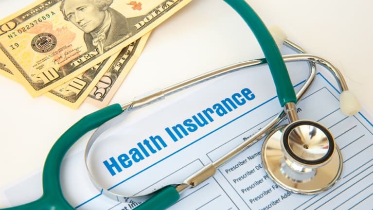 Health Plan Premium Surcharges for the Unvaccinated?
