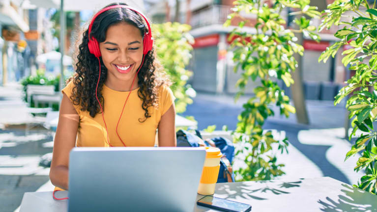 woman using laptop outside