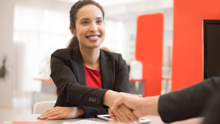 woman shaking hands