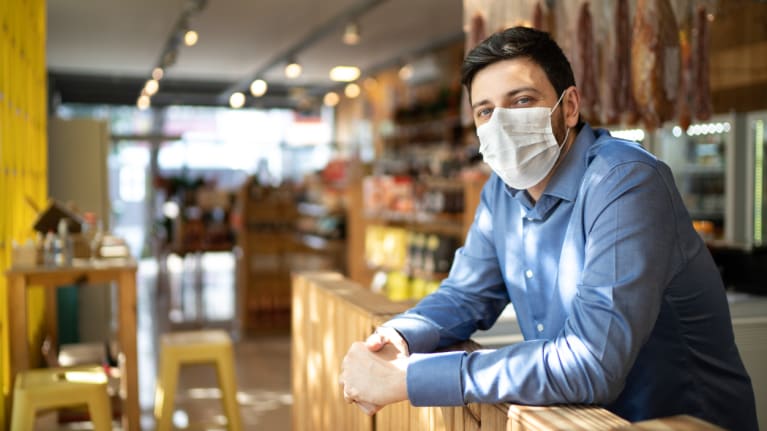 small business man wearing face mask