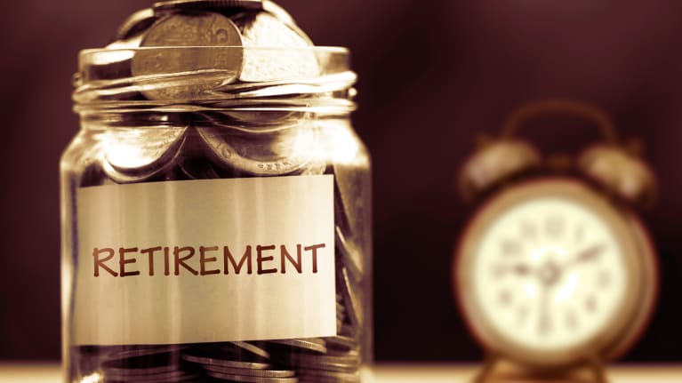 coin jar that says retirement with clock