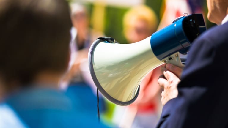 a union official on a bullhorn