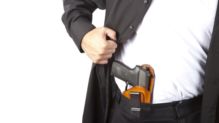 man with gun in waistband