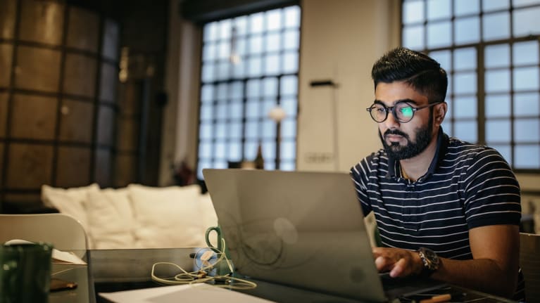 a worker at his computer