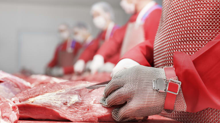Meatpacking employees at work