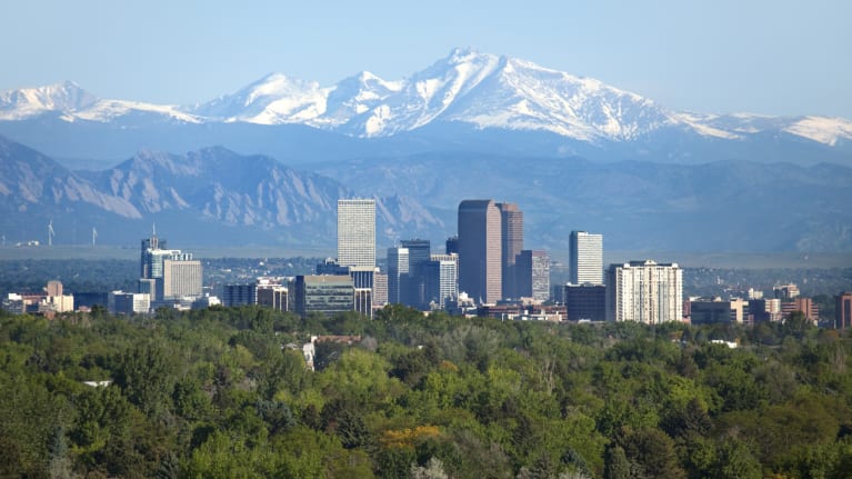 Denver skyline with the Rocky Mountains in the background