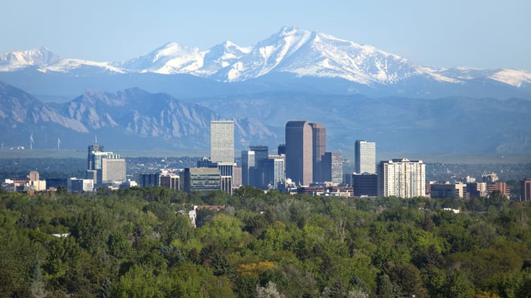 city skyline and mountains in colorado