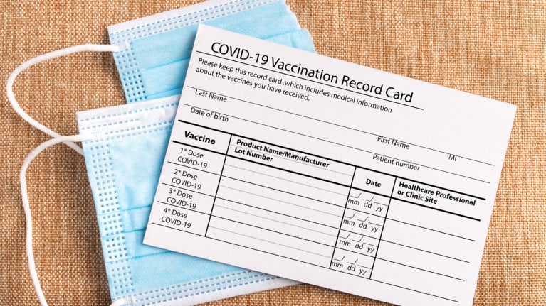 vaccination card and masks