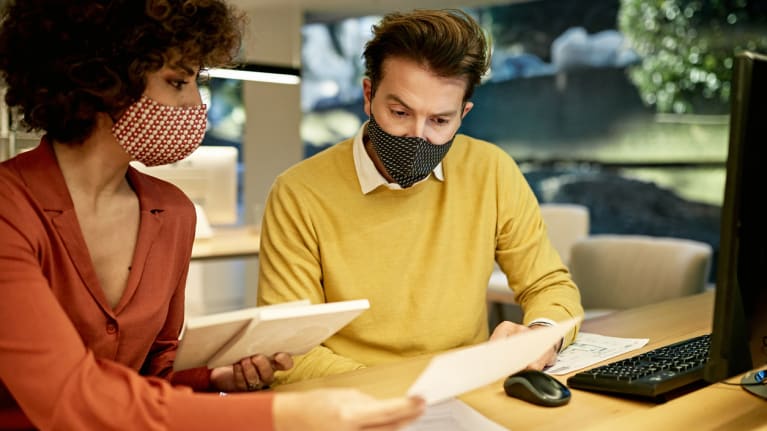 Business Partners Wearing Protective Face Masks