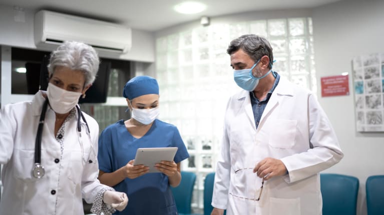 hospital employees wearing masks