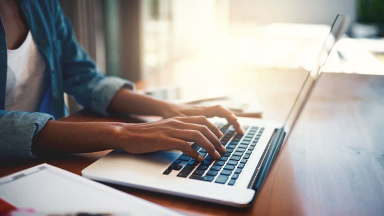 telecommuter working at a laptop