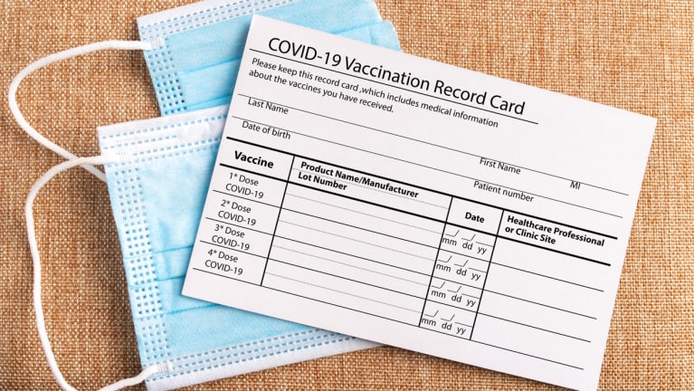 vaccination card and masks