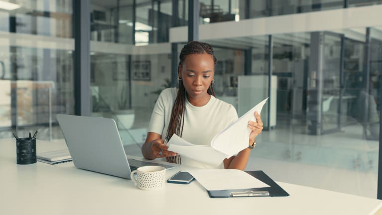 business woman reviewing agreement