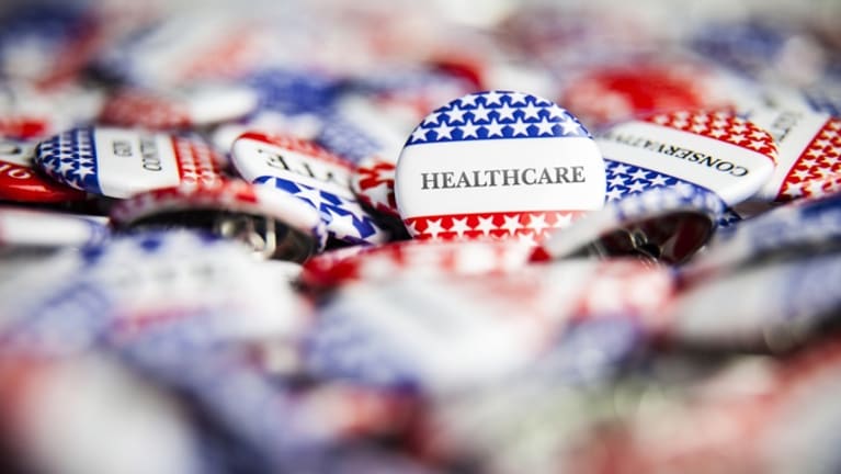 Campaign buttons that say healthcare.