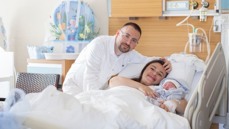 new-born-baby-with-his-parents