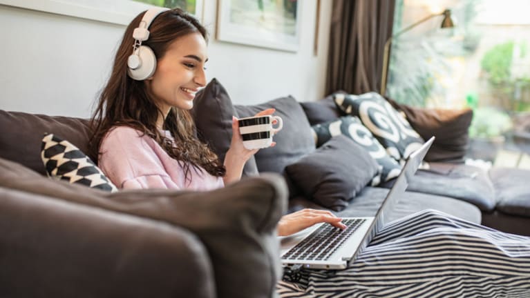 woman listening to podcast