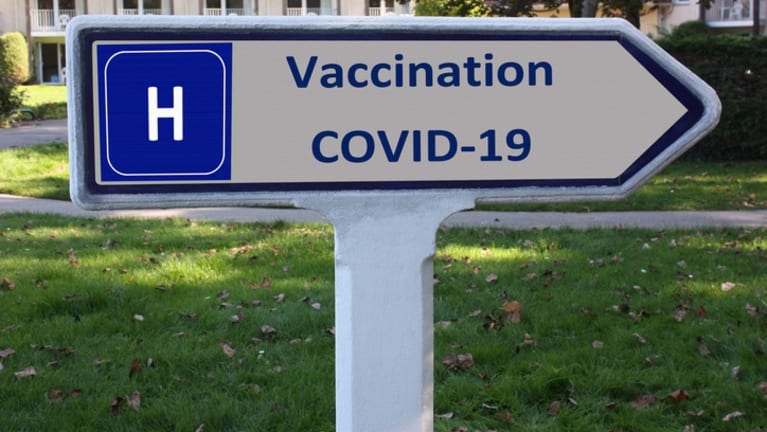 Covid-19 vaccination center - arrow sign