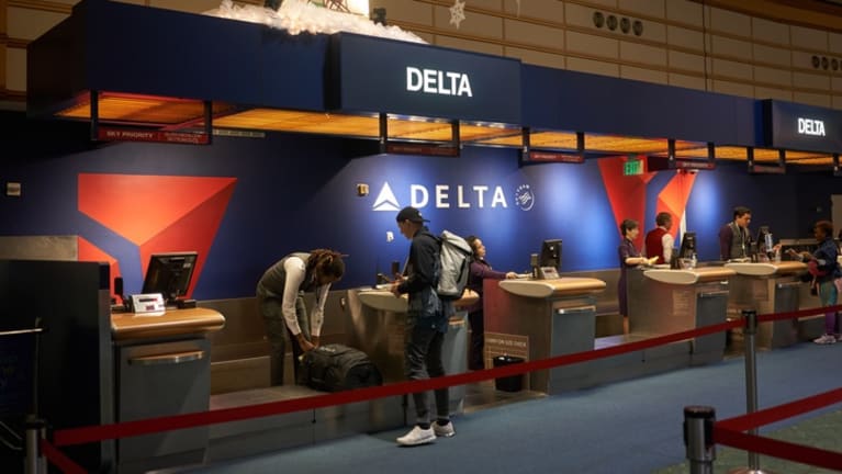 Delta Air Lines Charges Unvaccinated Workers $200 Monthly Premium Surcharge