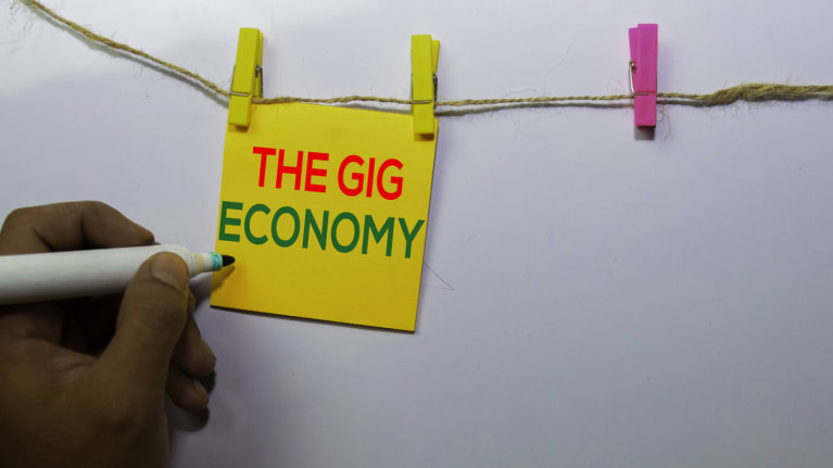 The Gig Economy written on a Post-It note